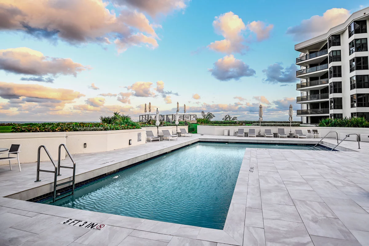 Oasis Palm Beach coastal pool environment