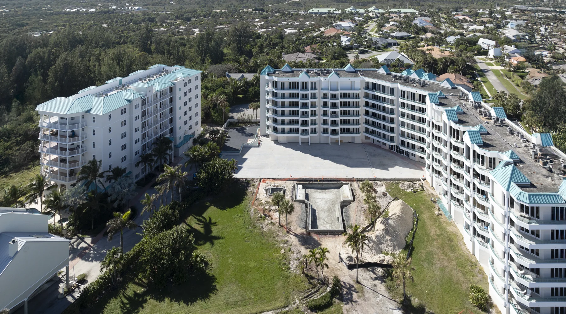 Ocean Club Jupiter coastal condominium pool renovation work zone