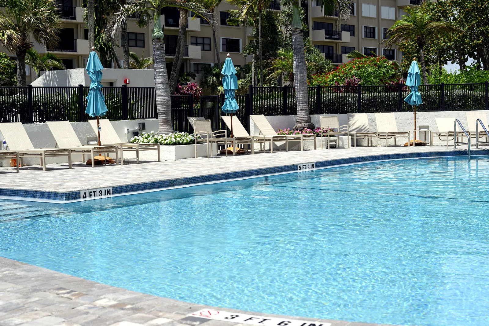 Sea Ranch renovated pool deck with lounge seating and coastal landscaping