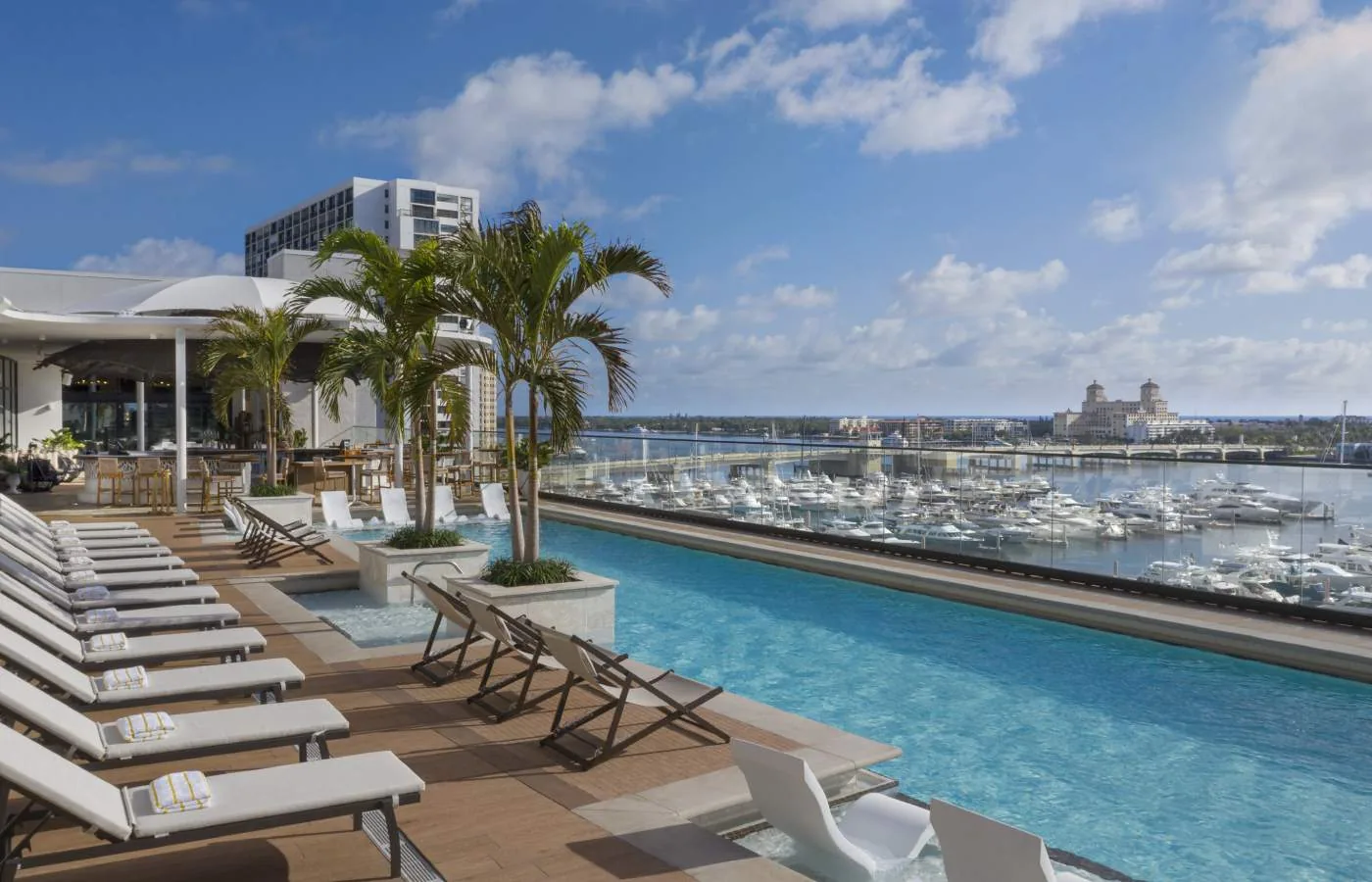 The Ben West Palm rooftop pool and waterfront amenity deck