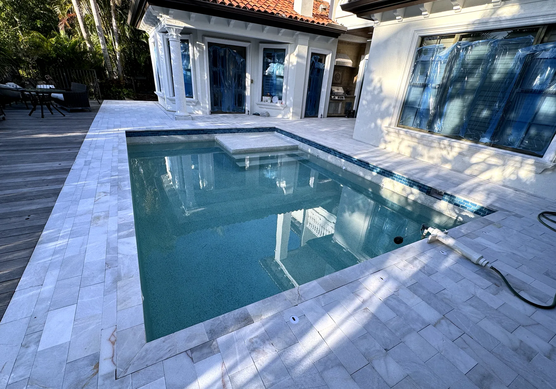 Coastal Key pool deck and outdoor setting