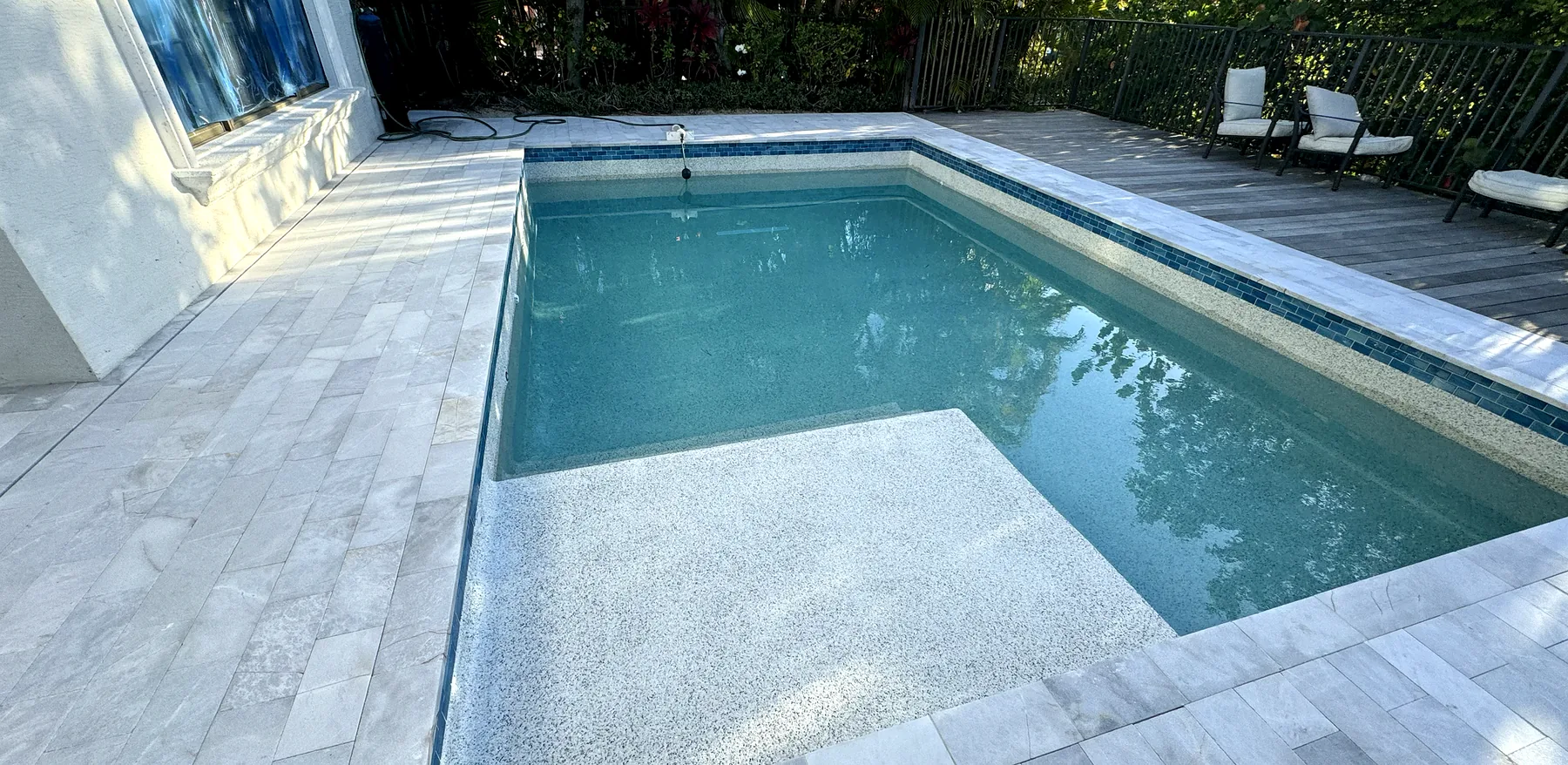Coastal Key waterline and pool finish details