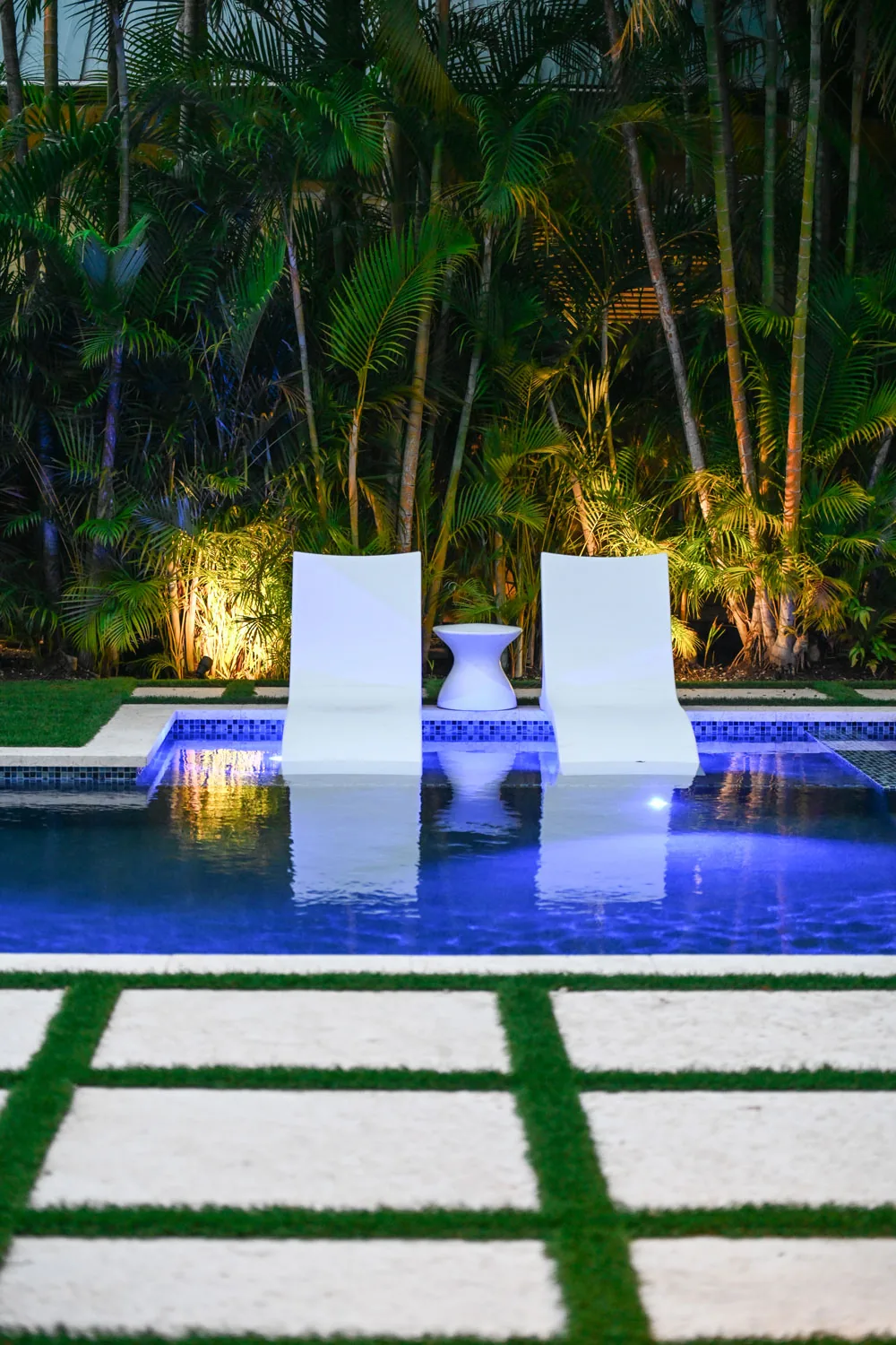 Residential pool water feature and lighting