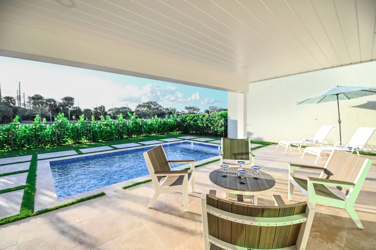 The Narrows covered patio and pool seating area